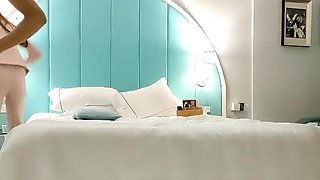 Cute amateur asian web cam girl playing with her toy