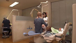 Elegant Dental Hygienist Leaning Close