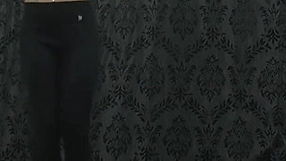 Under Nomi's Black Nike Sneakers