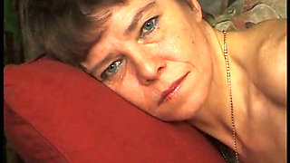 Mature woman playing with herself