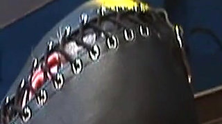 Dominatrix Trains Hooded Slave with Huge Dildo