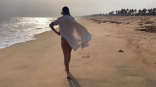 Blonde with Big Natural Breasts Walks Naked Outdoors.