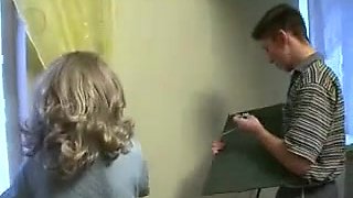Rus Mom hang curtain with son. Fake Video