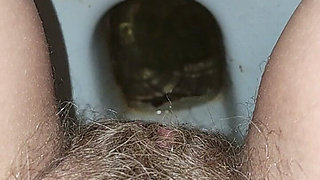 Big Load of Pee From Hairy Pussy