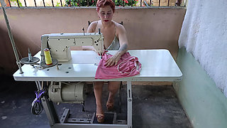 While Pedaling a Sewing Machine, It Gets Stuck, and She Receives Some Unexpected Help