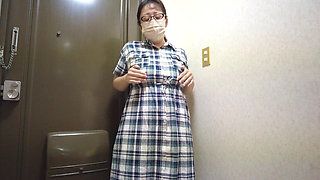 A Married Woman Masturbating Passionately in Front of the Entrance