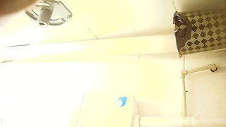 Cute amateur asian web cam girl playing with her toy