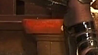 Chained Mature Brunette MILF Endures Nipple Weights and Spanking