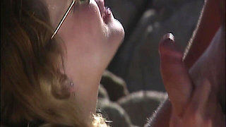 She Lies Naked on the Beach While He Watches Her