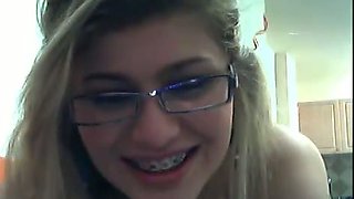 Slender nerdy teen in glasses with brackets gives me private webcam show