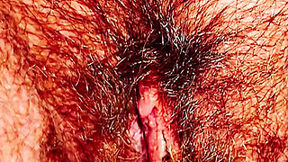 Hairy Pussy in Close-up Peeing a Yellow