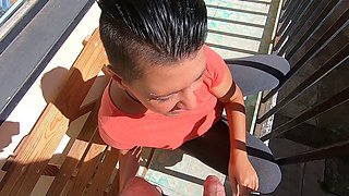 Blowjob and swallow in the sun on the balcony