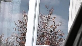 Naked MILF in Public: Blonde Wife Without Panties Washes Window as Taxi Driver Watches