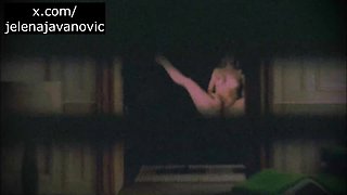 Spy Blonde Woman at the window
