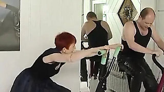 Redhead granny gets her pussy destroyed by horny gym trainer