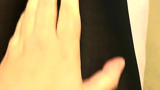 Brunette with foot fetish rubs big dick with her feet in POV