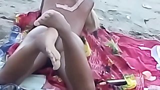 My stepdaughter teases me on the beach