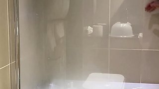 Tattooed beauty indulges in hot masturbation in the shower