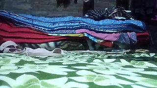 Closeup fingering hairy pussy and pee in her bed with bringal.