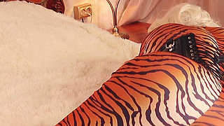 Submissive MILF gagged and bondage taped in spandex catsuit