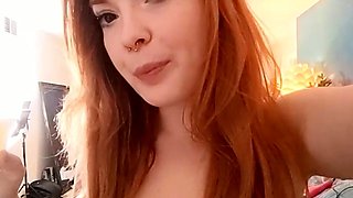 Natural redhead with real big boobs Scarlette masturbates