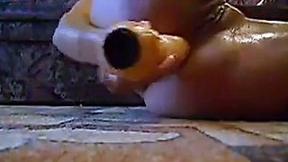 Oiled Russian Girl Plays With Dildo On Webcam