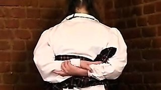 Teen floozy in a fetish schoolgirl uniform