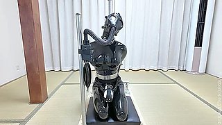 Asian rubber sissy gets tightly restrained and punished