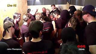 Bukkake Slut Gets Her Face Drenched by a Massive Crowd