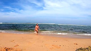 Blonde Babe's Naked Swim in the Ocean