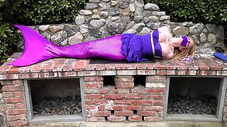 Enticing mermaid with big tits gets restrained and abandoned