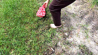 Completely Naked Through the Woods While Slapping Her Breasts