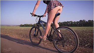 Schoolgirl Rides A Bike Upskirt White Panties