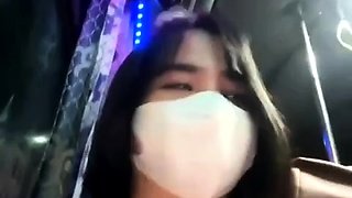 Teen on the bus hinting at showing breasts and being sensual