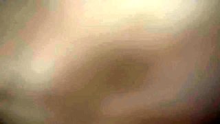 Cute amateur asian web cam girl playing with her toy