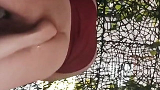 Dominatrix Shoves Her Foot Into the Ass of a Submissive Guy