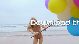 Sexy naked MILF playing with her baloons