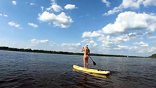 Big-Ass Blonde's Naked Walk on a Paddleboard