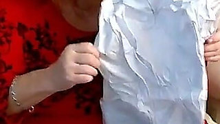 BBW Mature Redheaded Nurse Vicki Blows up Inflatable Snowman for You