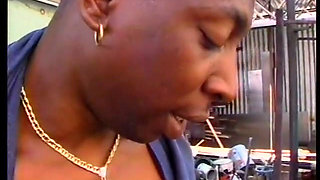 Black MILF eats dick before getting fucked from behind