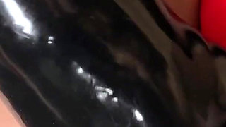 Latex Maid Masturbating at Work