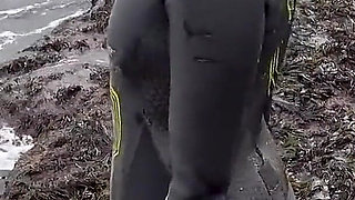 Rubbery Beach Encounter: Lucy's Neoprene Pussy Play with Stranger