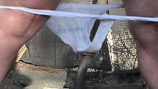 Pissing White Knickers Outside in Bondage