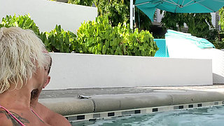 Getting frisky in the hot tub. Boob play.