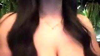 Brunette seductress working her big boobs and hot ass