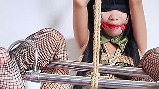 Fishnet Stockings Camouflage Outfit Girl Bondage and Discipline