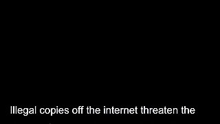 In a kitchen a sexy brunette playing with her big boobs