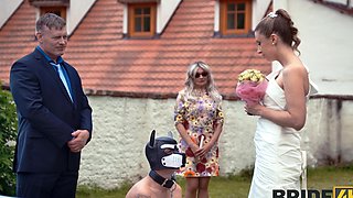 A hot bride is getting fucked outdoors by her husband in a steamy scene