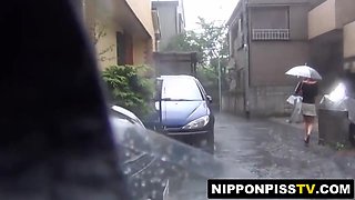 These Japanese vixens urinate outdoors past bustling road