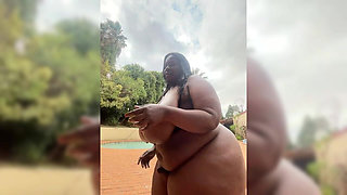 Ebony SSBBW MILF Stripteasing Outdoor